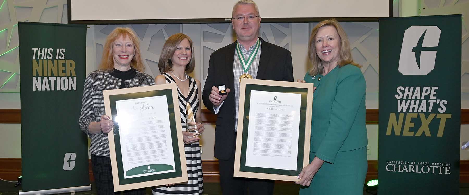 Kirill Afonin, Margaret Quinlan honored for research and mentoring excellence