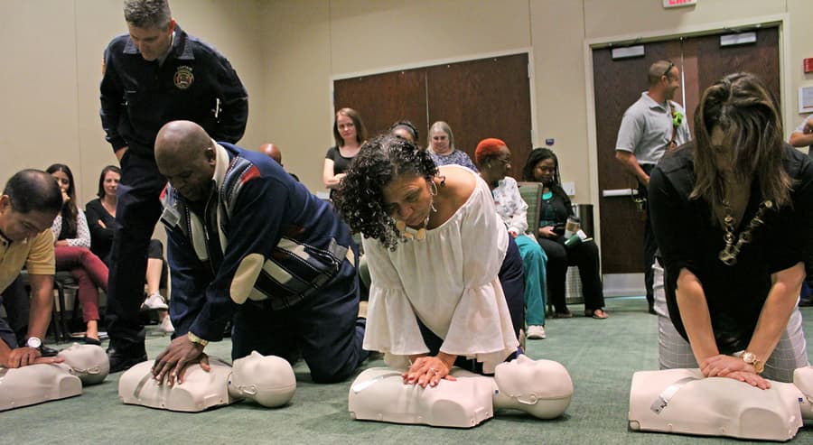 Faculty and staff participate in mass CPR training