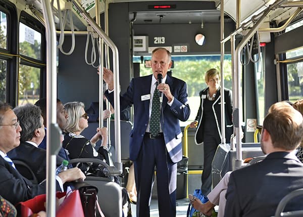Chancellor Dubois leads a campus bus tour for members of the UNC Board of Governors