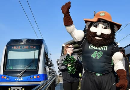 Norm celebrates the opening of light rail