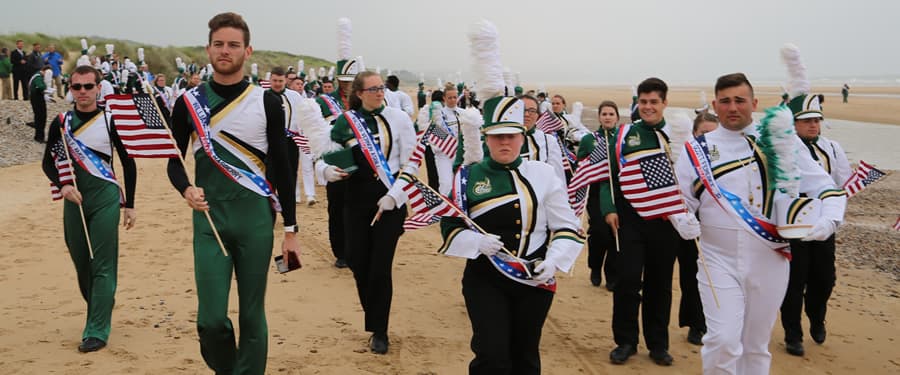Members of marching band at Omaha Beach