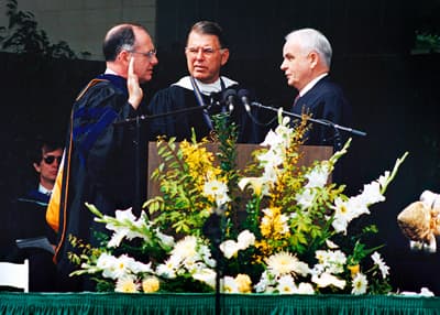  C.D. Spangler, center, presided at Chancellor Woodward’s installation in 1990.