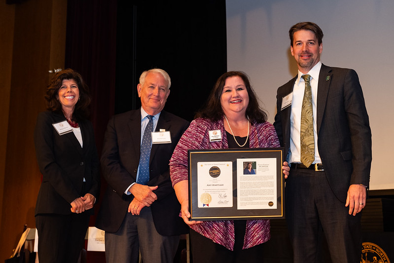 Amy Wartham receiving Governor's Award
