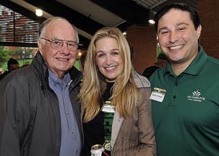 Chancellor Emeritus Jim Woodward with Alumni Association president Steven Steiger (’04) and his wife Stephanie (’05). 