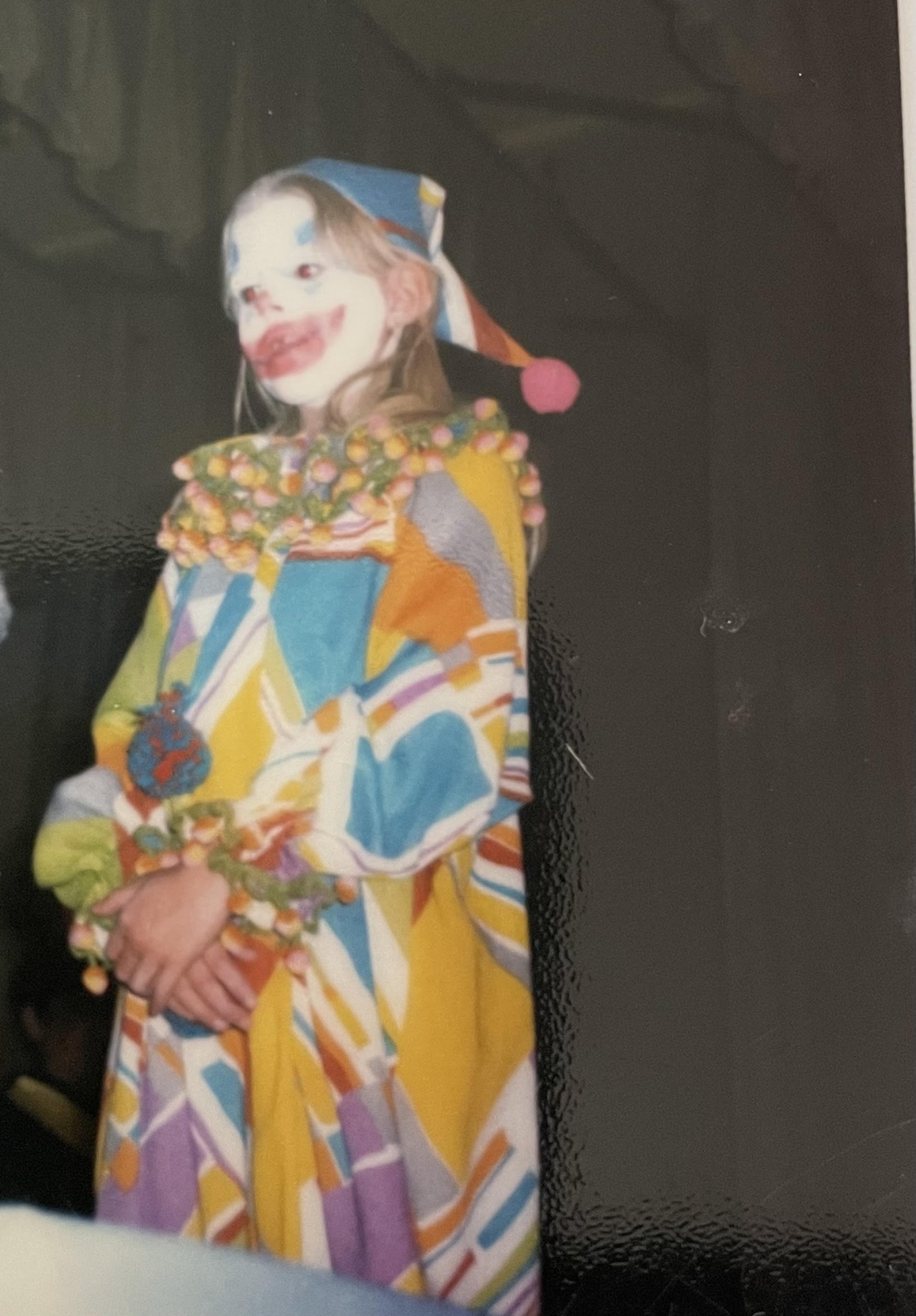 Christine Reed Davis in a clown costume for Halloween.