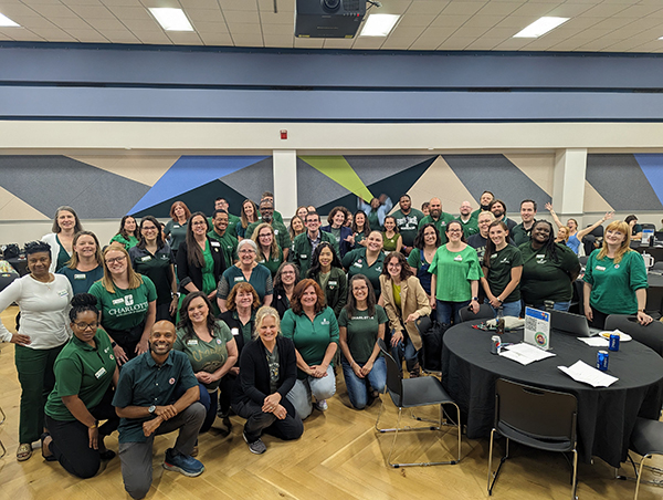 Photo of Academic Advisors and Friends Wearing Green