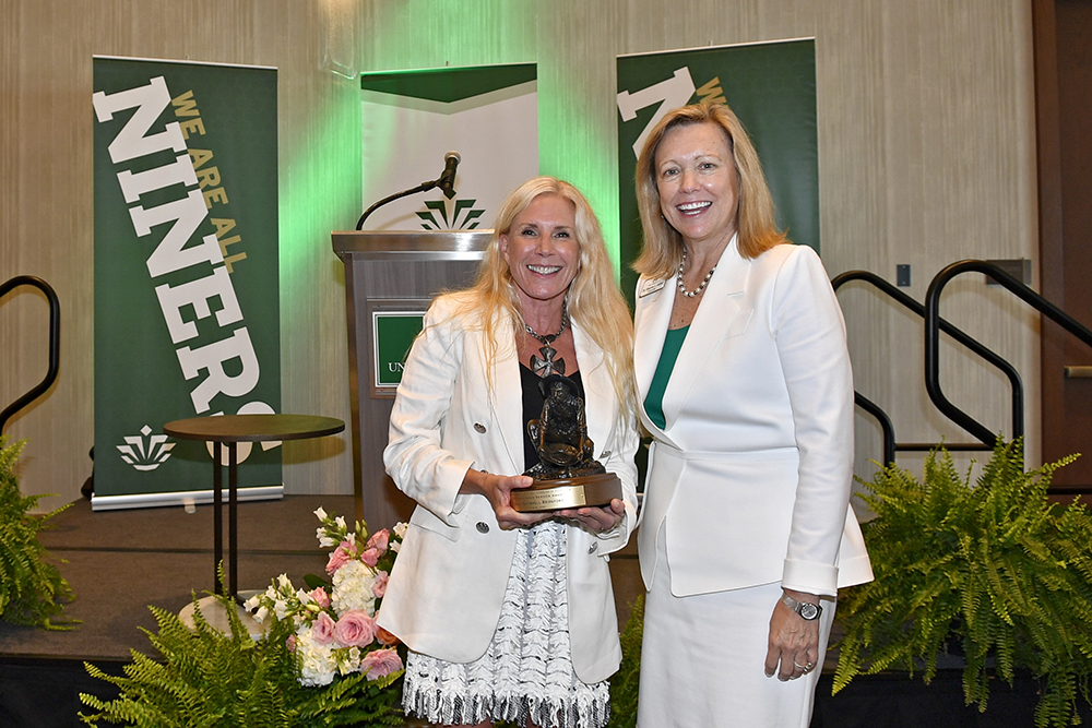 Sally Gambrell Bridgford receives UNC Charlotte’s 2021 Distinguished Service Award (pictured here with Chancellor Sharon L. Gaber)
