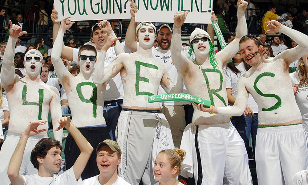 Students cheering at a Charlotte 49ers game