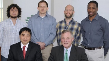 Sen. Burr with Bill Chu and graduate students