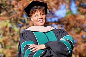 Denise Wynn in graduation attire