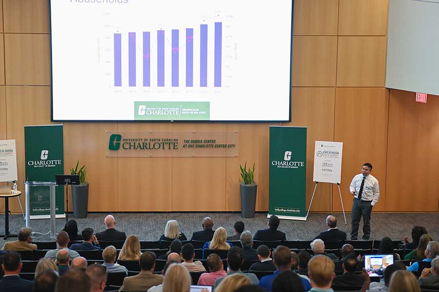Photo of a staff member presenting at the Dubois Center