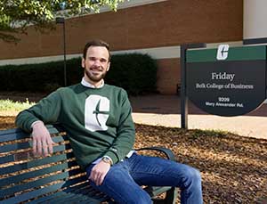 Brian Sirois sits outside the Friday building