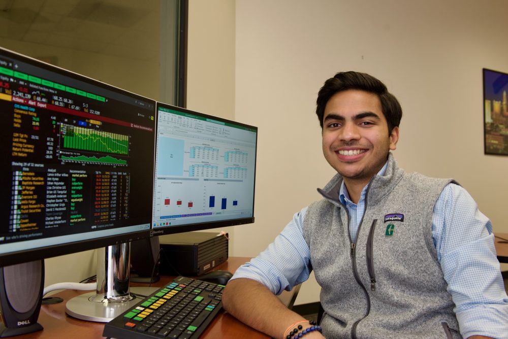 Pranav Jain sits at computer