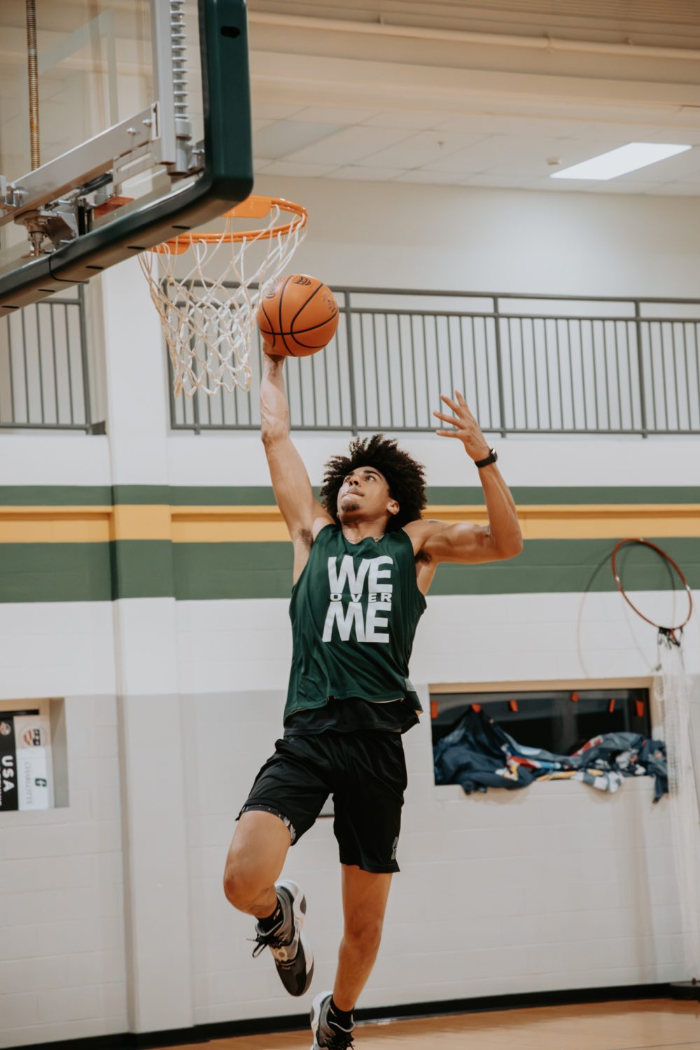 Men's Club Basketball Player Dunking