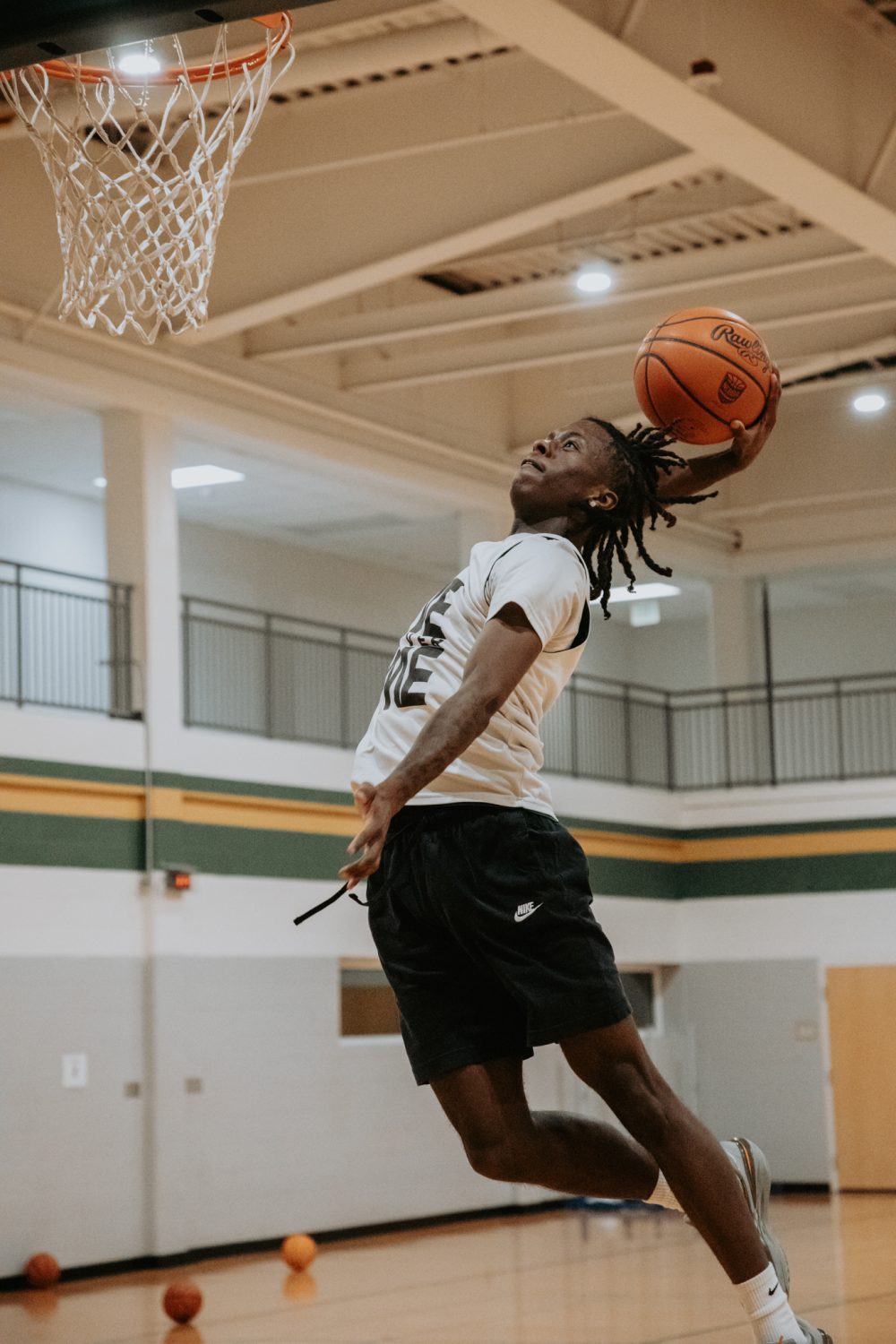 Men's Club Basketball Player Dunking