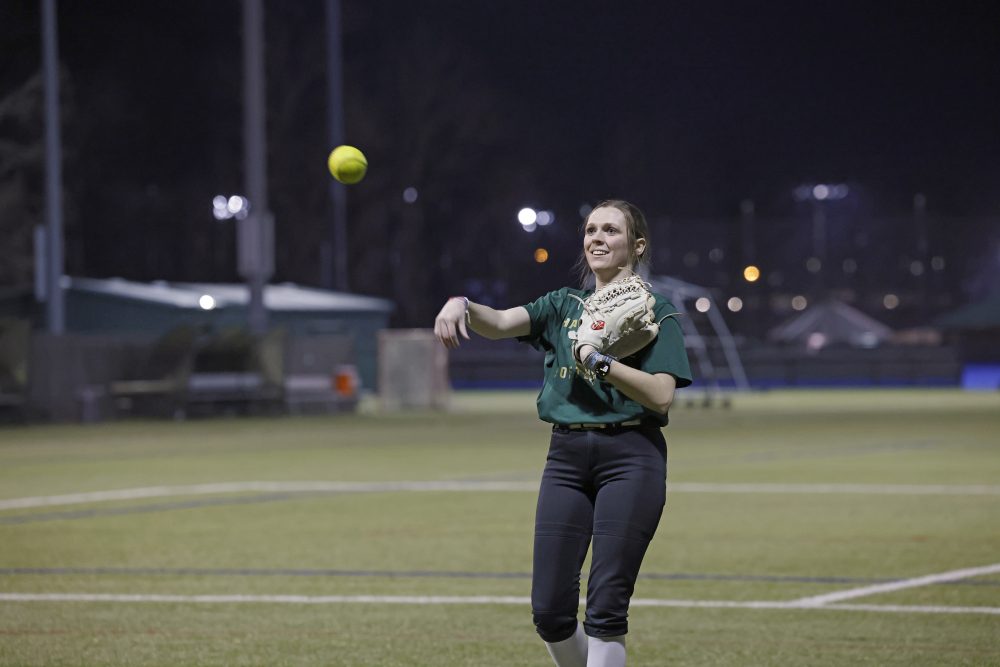Club Softball player throwing