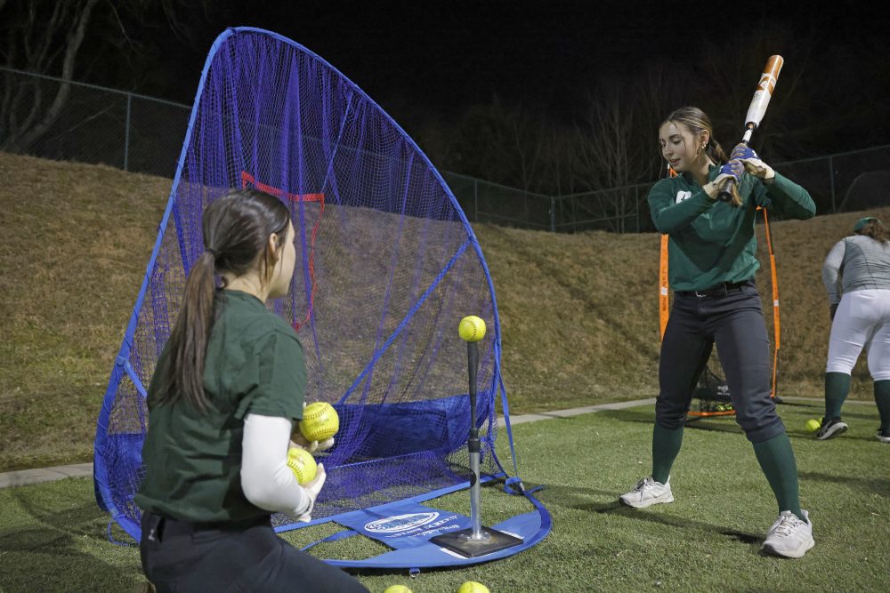Club Softball team practicing 