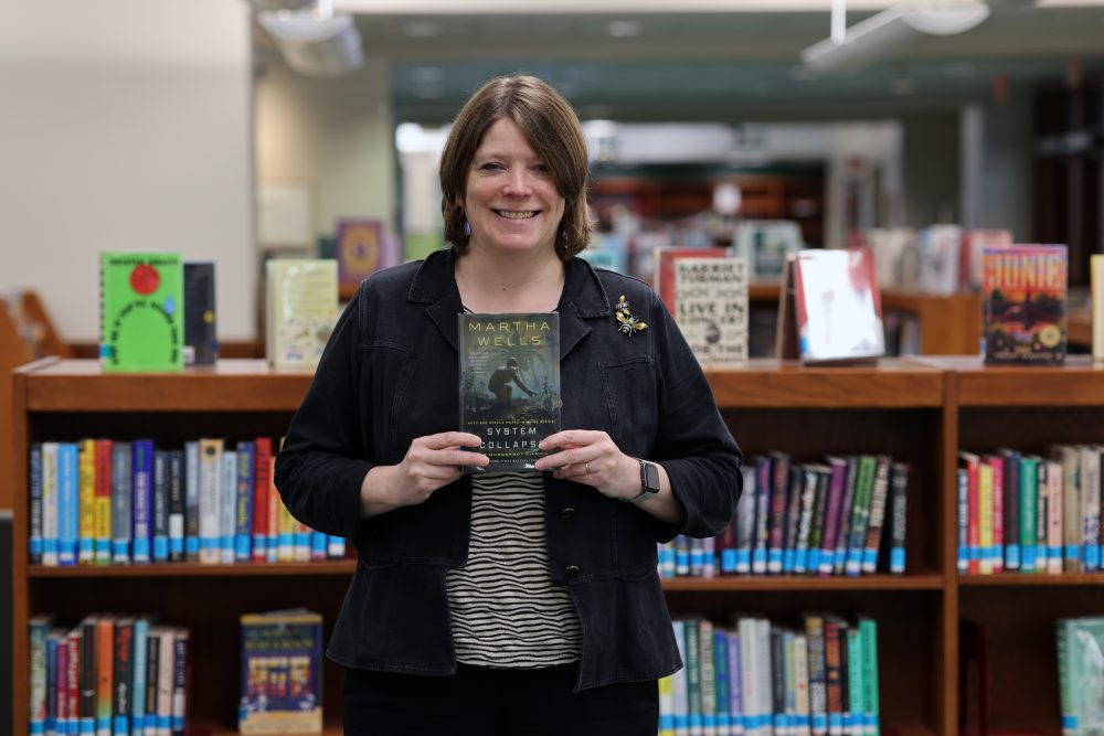 Dean Sexton displays her summer book recommendation