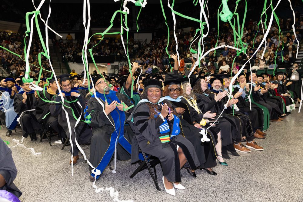 Confetti rains down to celebrate graduates
