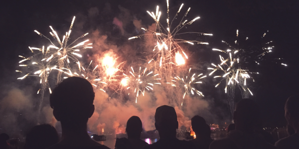 Stock photo of people watching fireworks