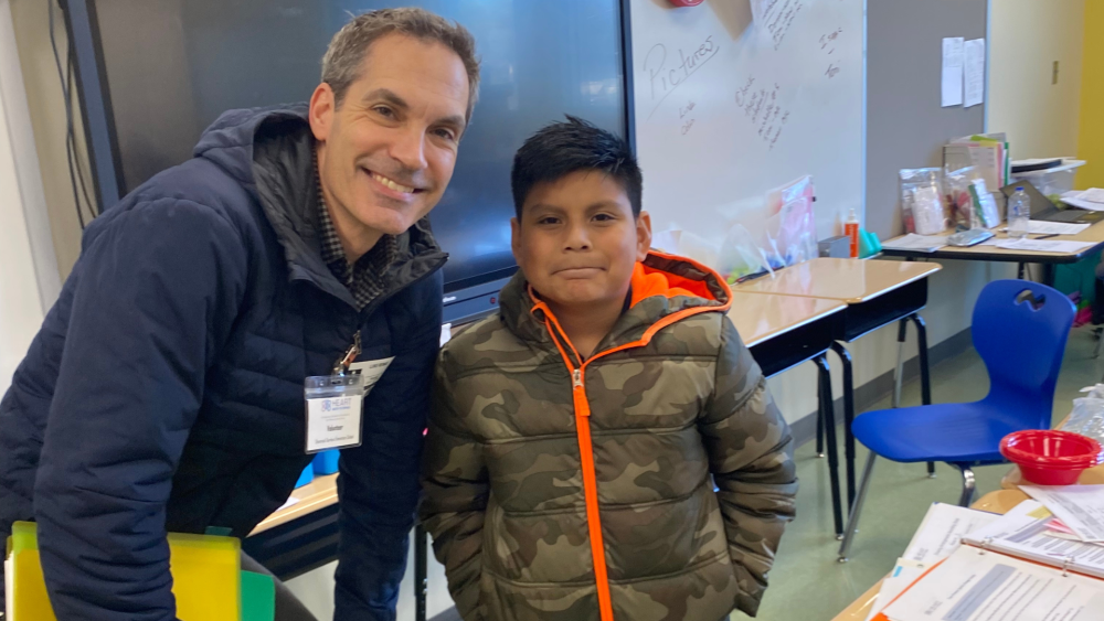 Luke Reinke tutors an elementary student