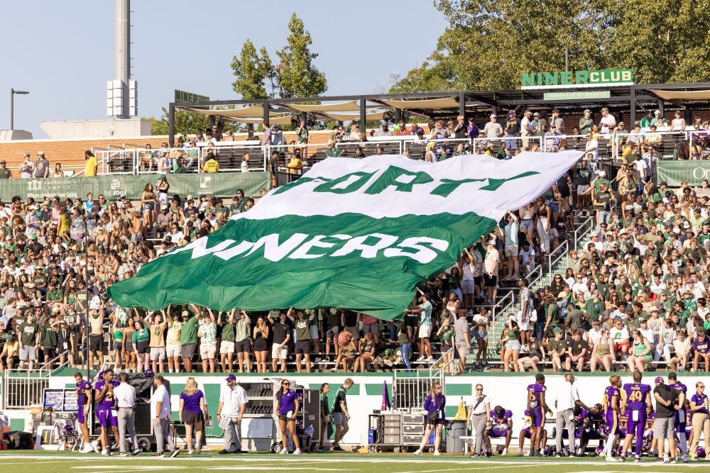 Forty Niners flag in the stands at a football game