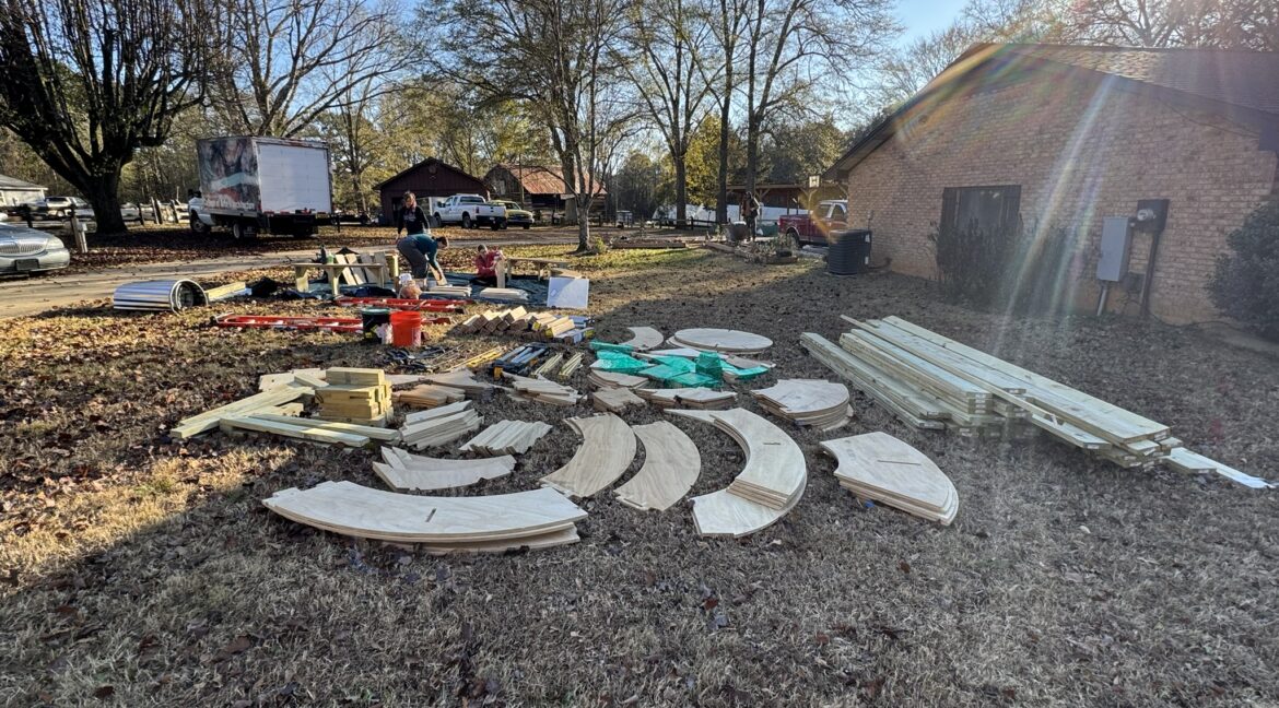 Peterson building art in a park