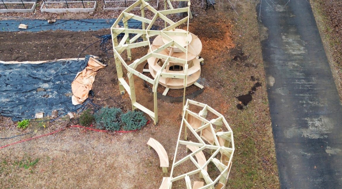 Peterson building art in a park