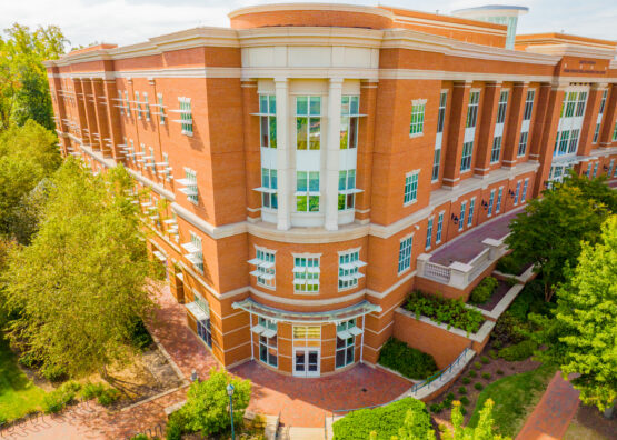 Side facing zoomed in aerial photo of the EPIC building on UNC Charlotte's campus