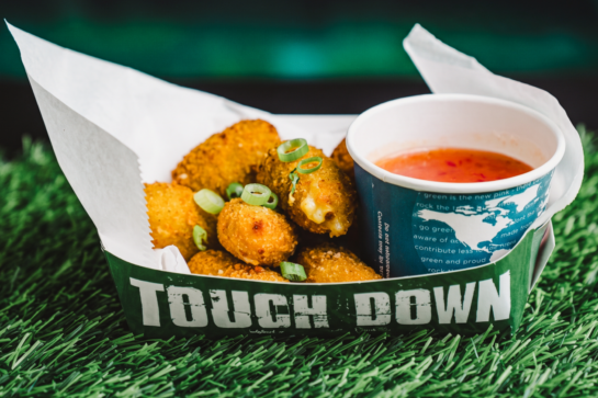 MacNCheese Bites (Crop) Smoked gouda bites with house chili sauce and scallions.