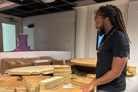 Prototype 1 Revised Assistant Professor Kyle Spence working on a project