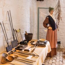 A mannequin and antique tools at Rosedale Plantation