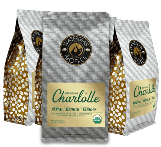 Three bags of Waterbean Coffee with gray herringbone patterns and gold side panels.