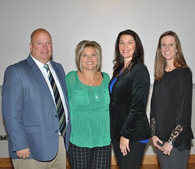 Conni Branscom, second left, with her husband, David; co-worker and alumna Jenny Roberts; and University academic advisor, Liz Adkisson.