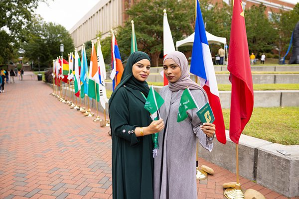 Photo of two people at international festival