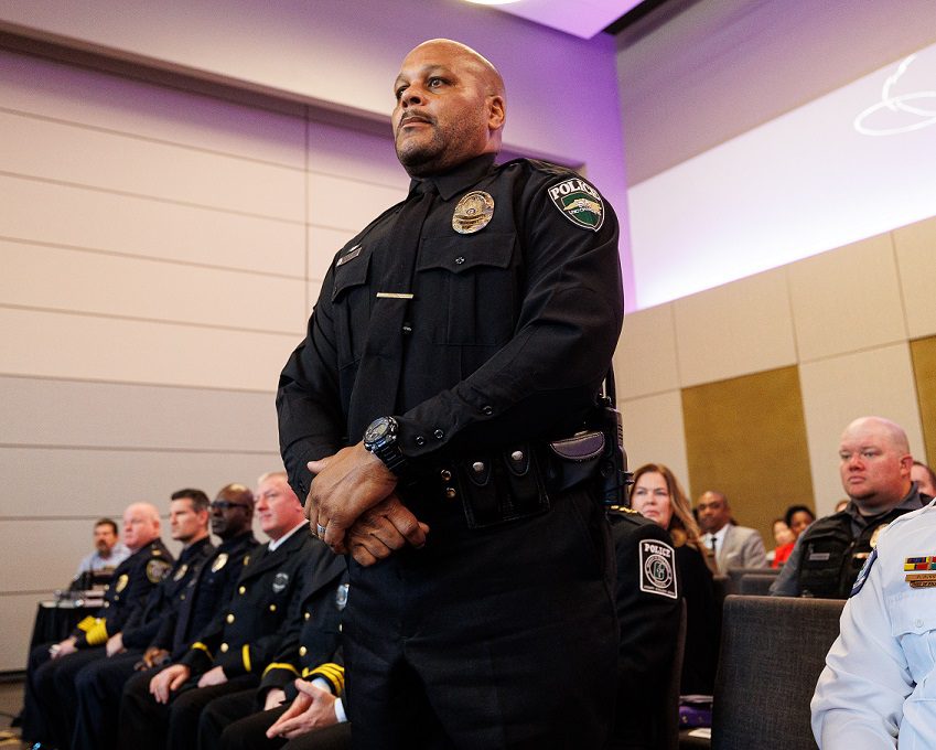 Officer Mike Reynolds is honored during a ceremony by the UNC System for his exceptional service.