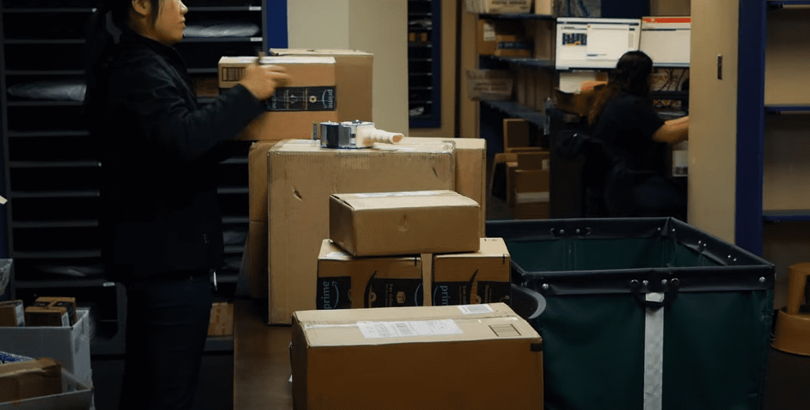 Photo of post office worker with packages