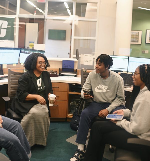 Regena Brown working with students