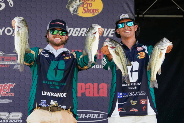 UNC Charlotte Bass Fishers Jake Monti and Joe Lutz show off largemouth bass they caught at the Bassmaster College Championship