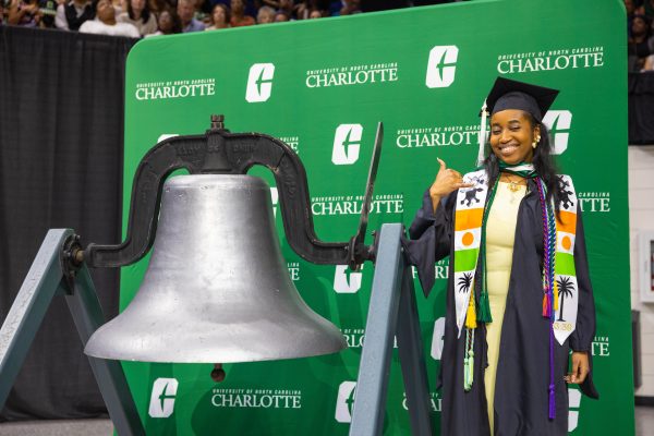 Pennda Arami serves as bell ringer for the ceremony