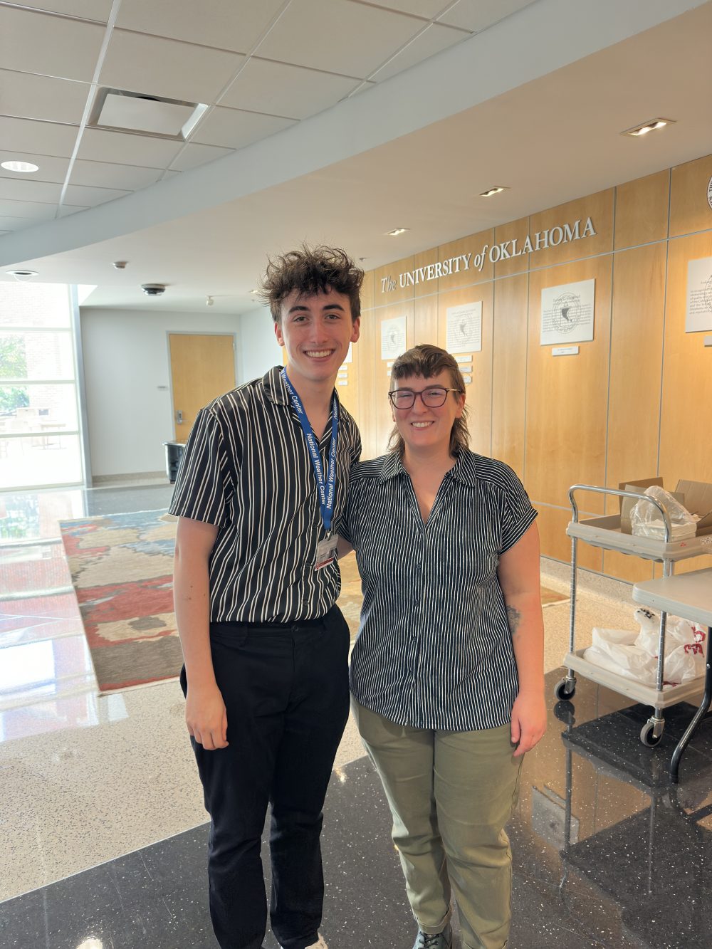 Ian Shank poses with internship supervisor