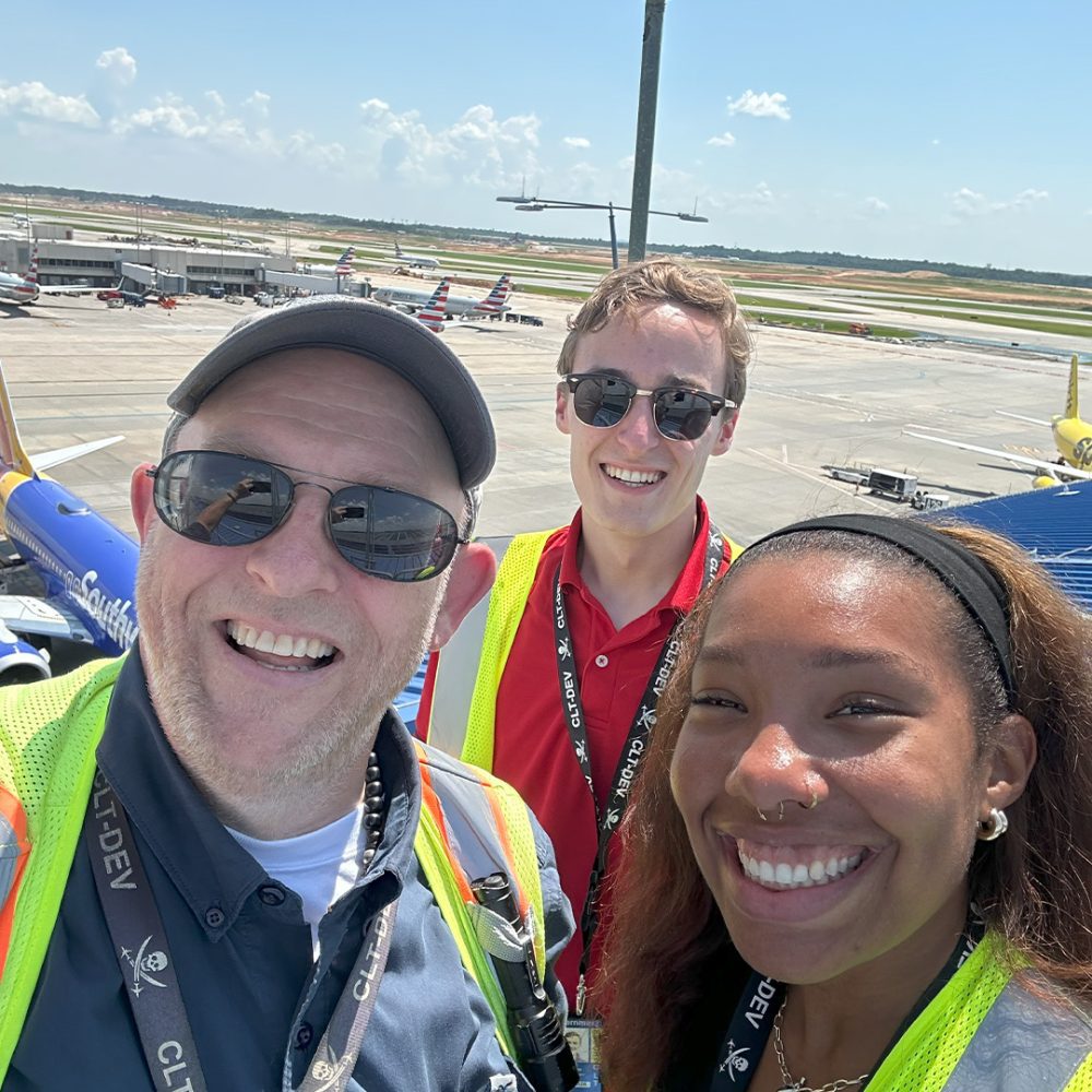 Myla Marve with co-workers at the Charlotte Douglas International Airport