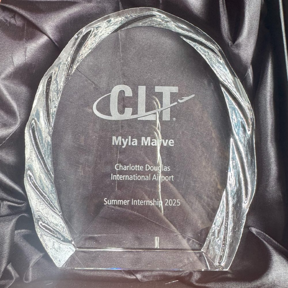 An award given to Myla Marve for completing her summer internship at Charlotte Douglas International Airport