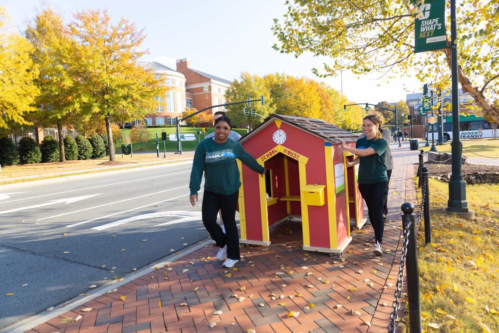 Levine Scholars haul completed playhouse