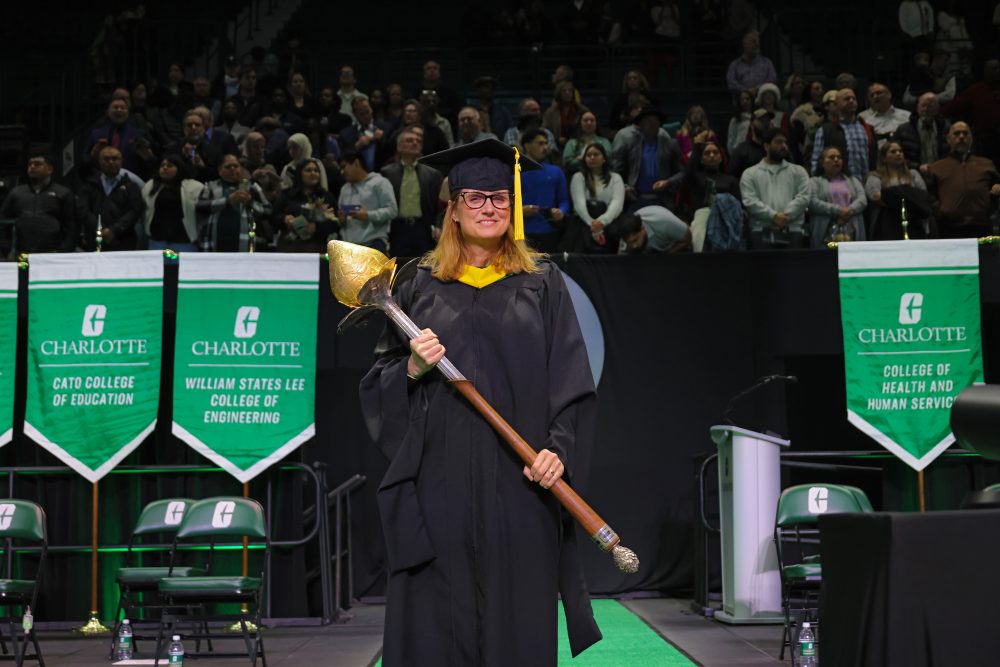 Faculty member Jeanne-Marie "Ree" Linker served as University marshal.