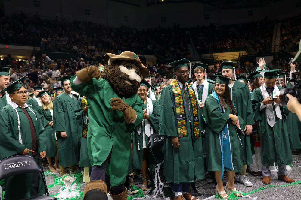 Norm celebrates with the graduates