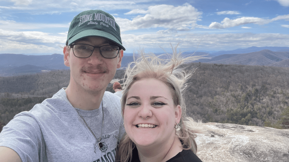 Logan David and girlfriend overlooking stone mountain state park