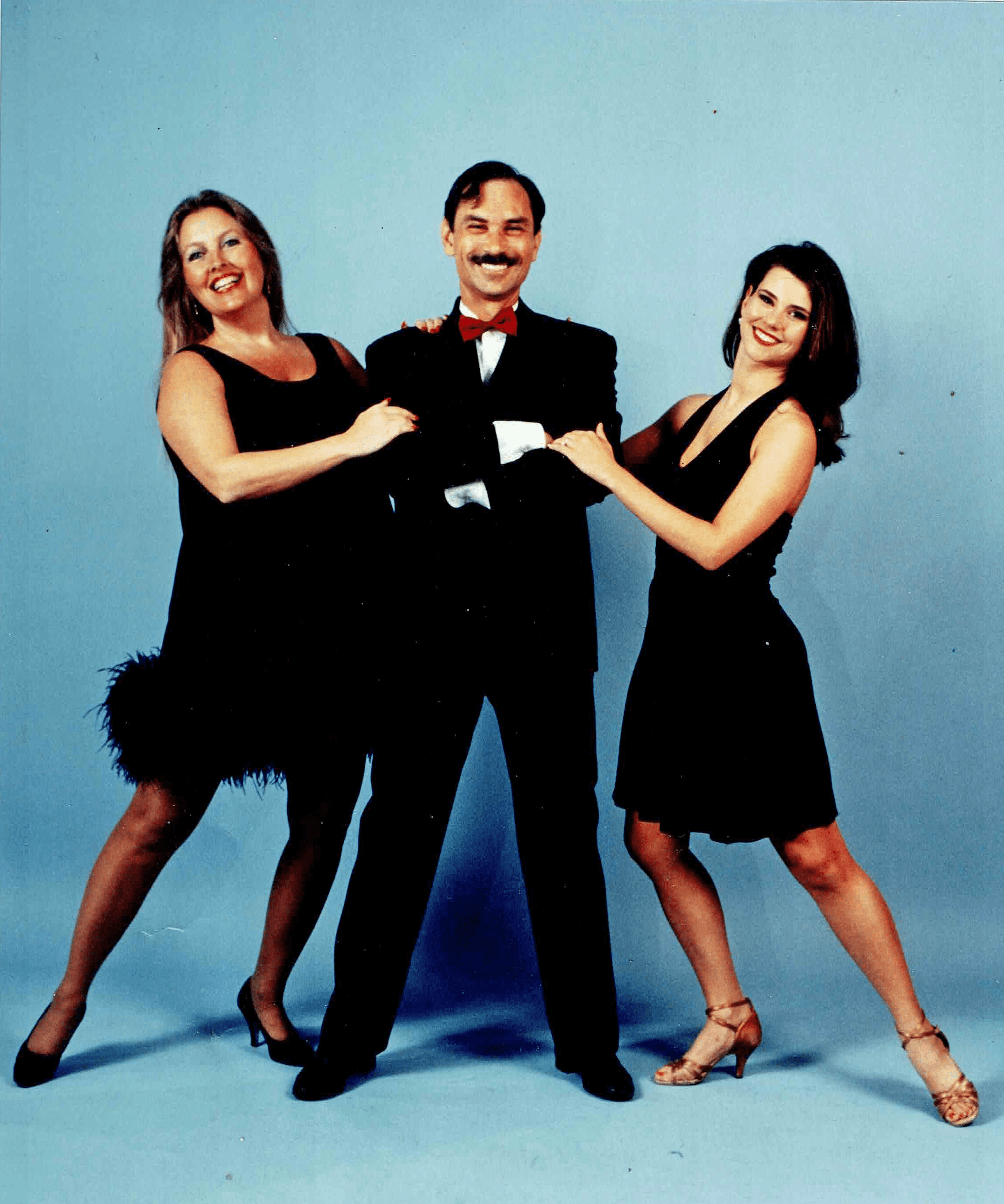 ken_ballroom2 Ken Braswell and two females posing in a dancing photo