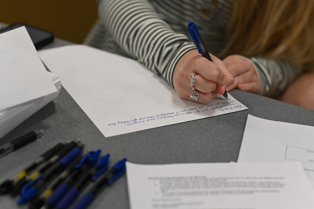 Close up of Reignite: Second Chance Scholars pen pal event