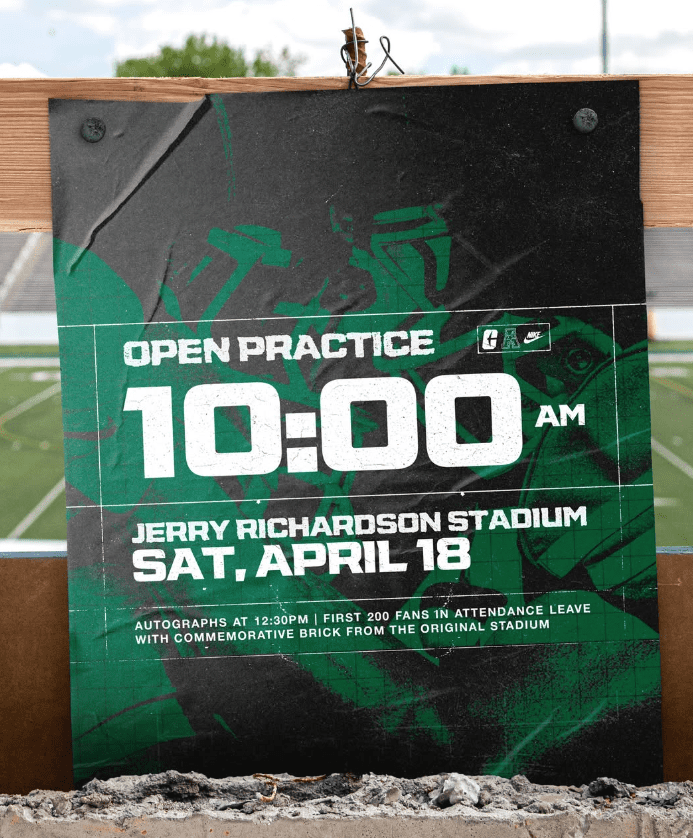 Sign advertising an open football practice at Jerry Richardson Stadium on Saturday, April 18 at 10:00 a.m., with additional details about autographs and fan giveaways.